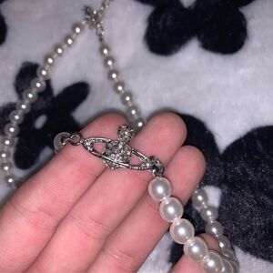 Elegant Pearl Necklace with Planet Pendant and Silver Clasp